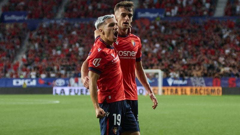 Bryan y Aimar celebrando el gol