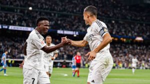 Vinicius y Lucas Vázquez celebrando