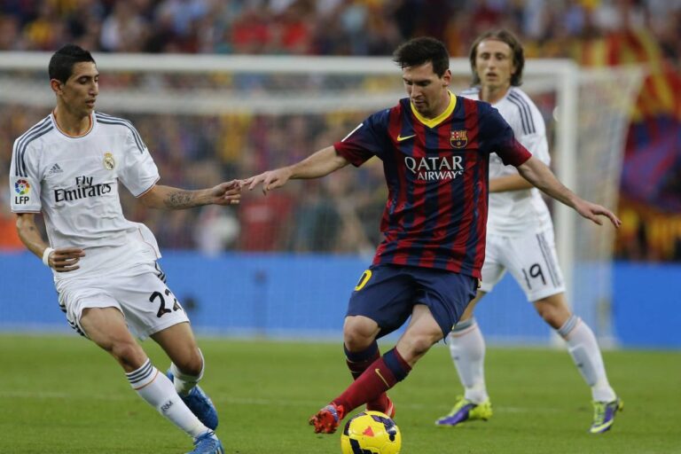 Di María y Messi durante un Clásico.